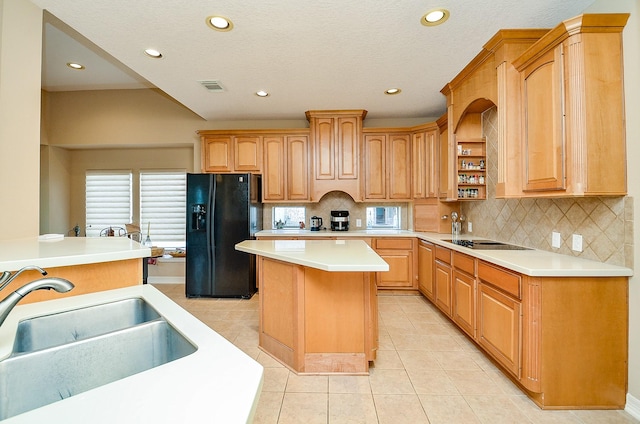5703 Bent Arbor Ln, Katy, TX 77450 - kitchen with black appliances, a sink, recessed lighting, a center island, and light tile patterned floors