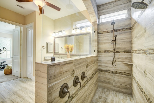 1417 Summer Field Ln, Friendswood, TX 77546 - bathroom featuring a tile shower and a ceiling fan