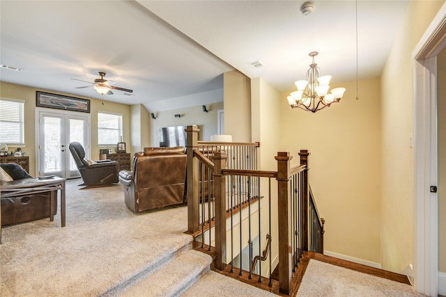 1417 Summer Field Ln, Friendswood, TX 77546 - stairs with carpet flooring, ceiling fan, a chandelier, and baseboards