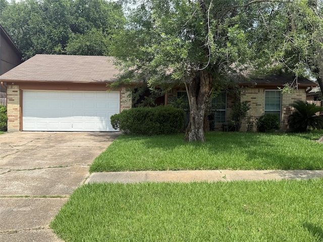 11110 Broken Sky Dr, Houston, TX 77064 - view of front of house with concrete driveway, brick siding, a front yard, and an attached garage