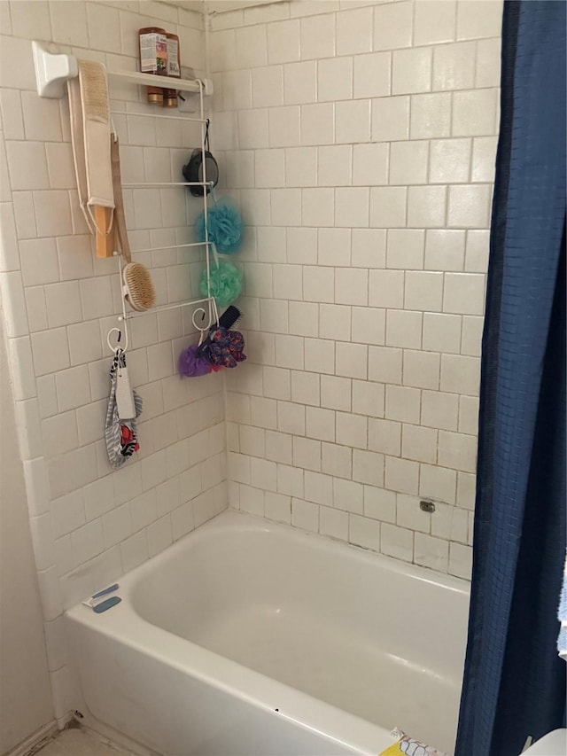 11110 Broken Sky Dr, Houston, TX 77064 - bathroom featuring shower / tub combo with curtain