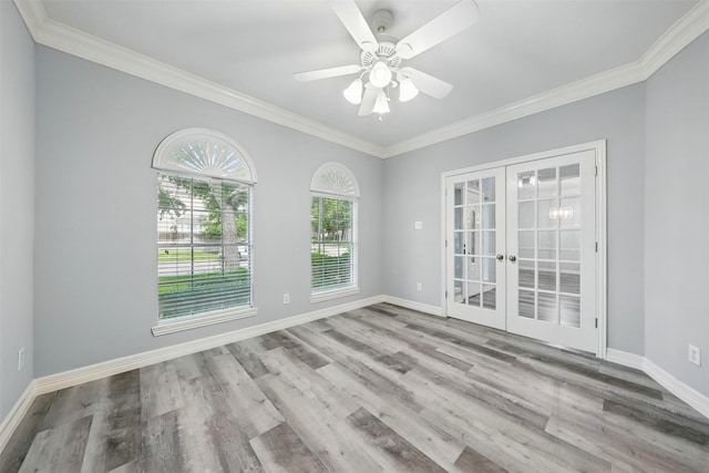 2003 Birnam Wood Dr, Sugar Land, TX 77479 - unfurnished room with french doors, ornamental molding, wood finished floors, baseboards, and a ceiling fan