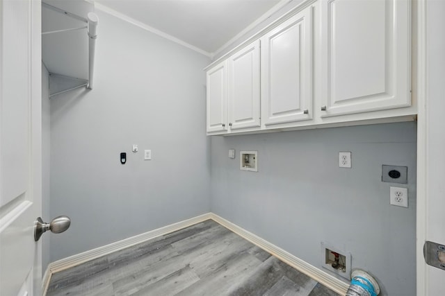 2003 Birnam Wood Dr, Sugar Land, TX 77479 - washroom with hookup for an electric dryer, cabinet space, washer hookup, ornamental molding, and wood finished floors