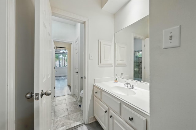2003 Birnam Wood Dr, Sugar Land, TX 77479 - full bath featuring toilet, vanity, a shower, and baseboards