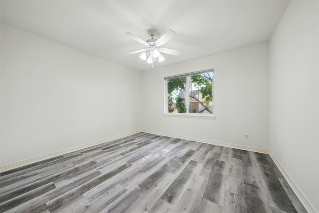 2003 Birnam Wood Dr, Sugar Land, TX 77479 - unfurnished room with wood finished floors, ceiling fan, and baseboards