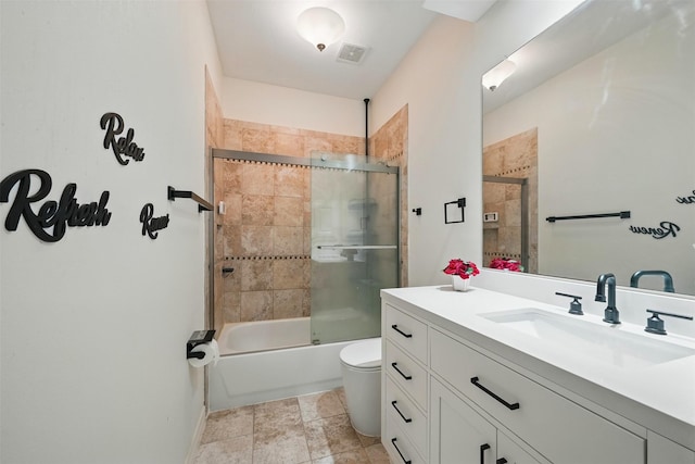 2003 Birnam Wood Dr, Sugar Land, TX 77479 - full bathroom with vanity, toilet, and combined bath / shower with glass door