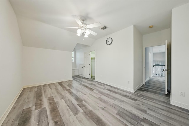 2003 Birnam Wood Dr, Sugar Land, TX 77479 - additional living space featuring wood finished floors, ceiling fan, baseboards, and vaulted ceiling