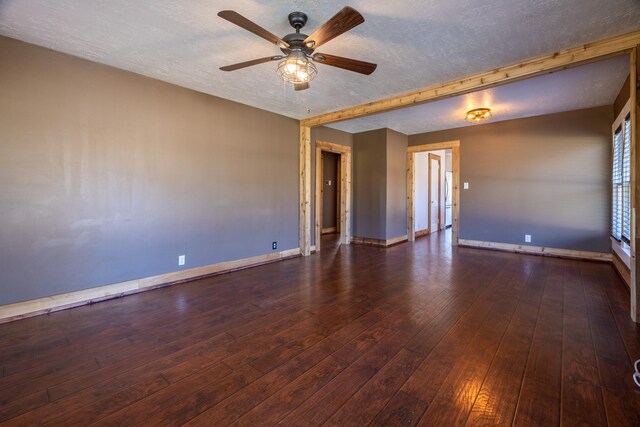 2175 Fm 1725th Rd, Cleveland, TX 77328 - empty room featuring a textured ceiling, baseboards, a ceiling fan, and hardwood / wood-style floors