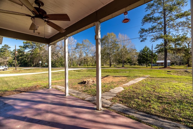 2175 Fm 1725th Rd, Cleveland, TX 77328 - view of patio / terrace featuring ceiling fan and view of scattered trees