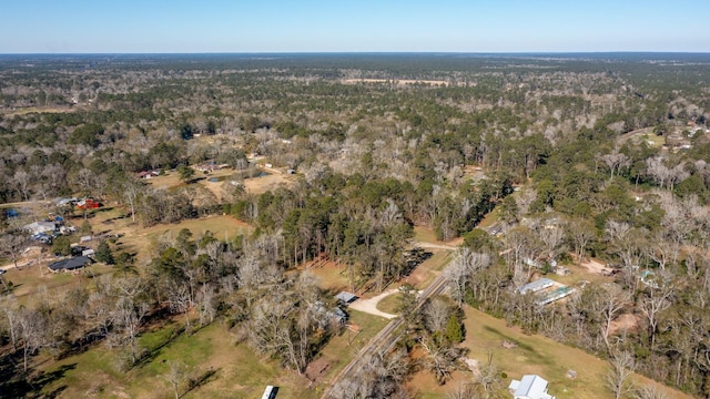 2175 Fm 1725th Rd, Cleveland, TX 77328 - aerial view of property's location with a heavily wooded area