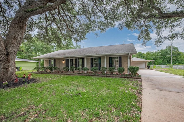 1316 Courtney St, Richmond, TX 77469 - ranch-style home featuring a front lawn, concrete driveway, brick siding, and a porch