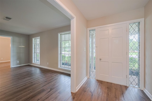 1316 Courtney St, Richmond, TX 77469 - foyer entrance featuring dark wood-type flooring and baseboards