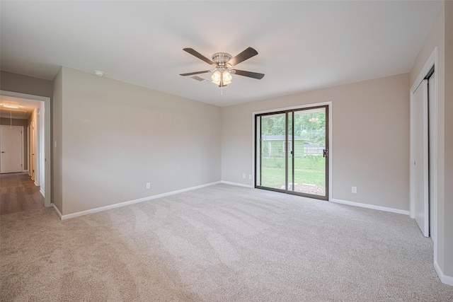 1316 Courtney St, Richmond, TX 77469 - unfurnished bedroom featuring carpet flooring, baseboards, a ceiling fan, and a closet
