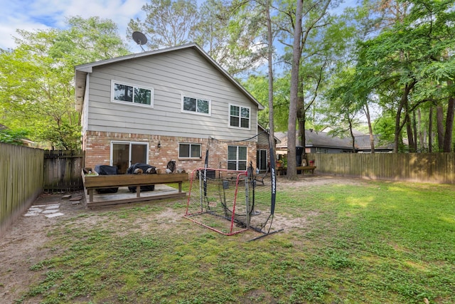 4 Hickory Oak Dr, Spring, TX 77381 - rear view of property featuring brick siding and a deck