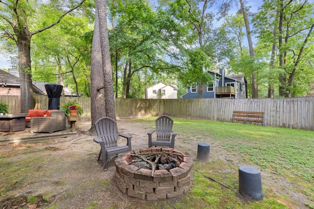 4 Hickory Oak Dr, Spring, TX 77381 - fenced backyard featuring a fire pit