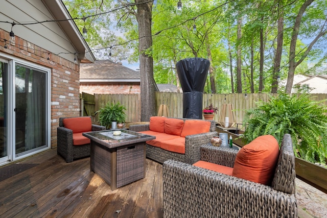 4 Hickory Oak Dr, Spring, TX 77381 - wooden deck with an outdoor hangout area and a fenced backyard