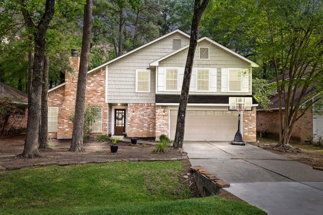 4 Hickory Oak Dr, Spring, TX 77381 - view of front facade with driveway, an attached garage, a chimney, and brick siding
