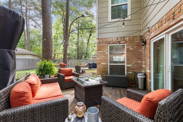 4 Hickory Oak Dr, Spring, TX 77381 - wooden terrace featuring a fenced backyard and an outdoor hangout area