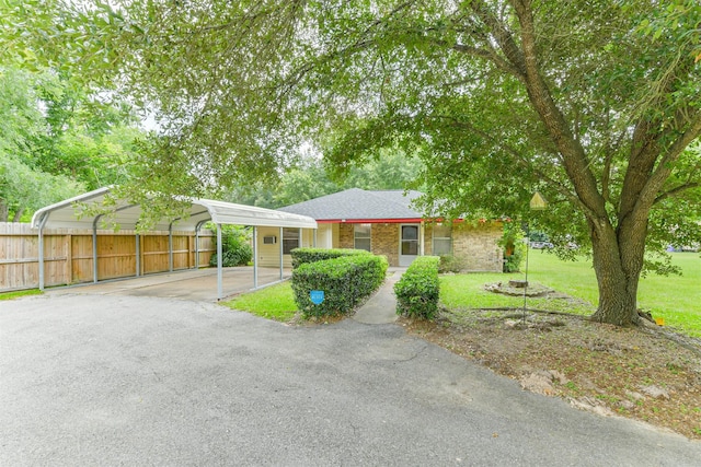 101 Ramey Ave, Cleveland, TX 77327 - single story home featuring a detached carport and driveway