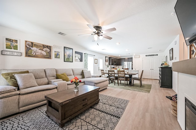 138 Austin Rd, Angleton, TX 77515 - living room featuring a ceiling fan, light wood-type flooring, and recessed lighting