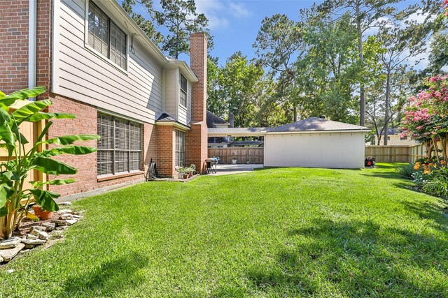 3911 Misty Gardens Ct, Kingwood, TX 77339 - view of yard featuring a patio