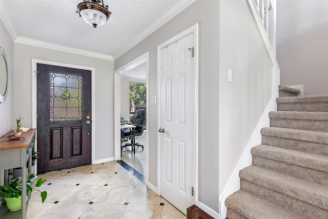 3911 Misty Gardens Ct, Kingwood, TX 77339 - entryway with ornamental molding, stairway, and baseboards