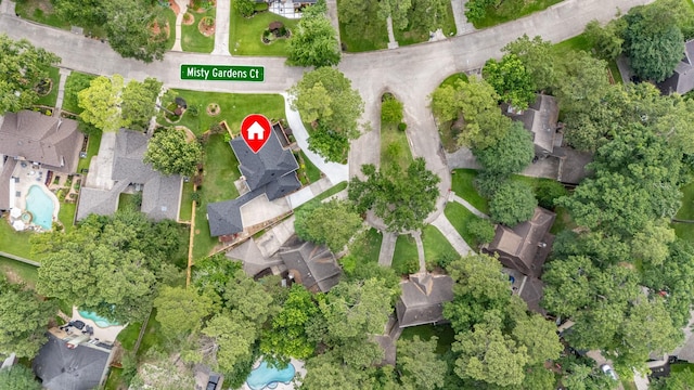 3911 Misty Gardens Ct, Kingwood, TX 77339 - aerial view of property's location featuring a pool area