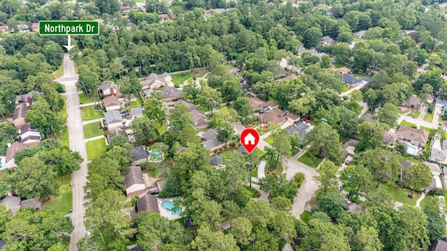 3911 Misty Gardens Ct, Kingwood, TX 77339 - aerial view of property and surrounding area with nearby suburban area
