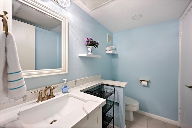 1601 S Shepherd Dr Unit 220, Houston, TX 77019 - half bath with toilet, tile patterned flooring, vanity, and baseboards