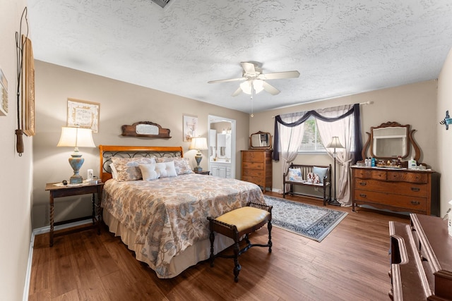 23826 Farm Hill Rd, Spring, TX 77373 - bedroom featuring a textured ceiling, hardwood / wood-style flooring, baseboards, ceiling fan, and connected bathroom