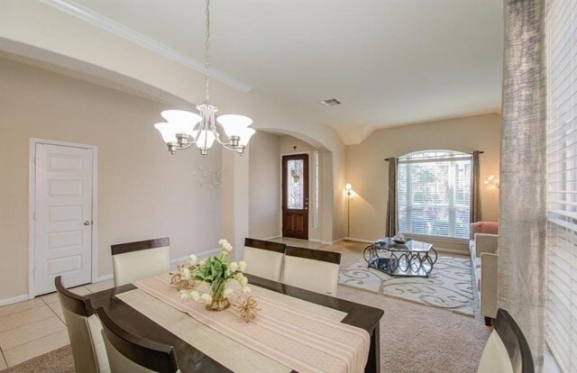 4419 Rolling Field Ln, Sugar Land, TX 77479 - carpeted dining room featuring arched walkways, a chandelier, and baseboards