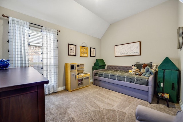 4011 Teramo Ln, Katy, TX 77493 - bedroom with light carpet, lofted ceiling, and baseboards