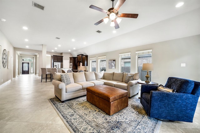 4011 Teramo Ln, Katy, TX 77493 - living area featuring ceiling fan, light tile patterned floors, recessed lighting, vaulted ceiling, and baseboards