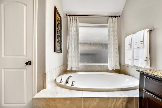 4011 Teramo Ln, Katy, TX 77493 - bathroom with a garden tub and vanity