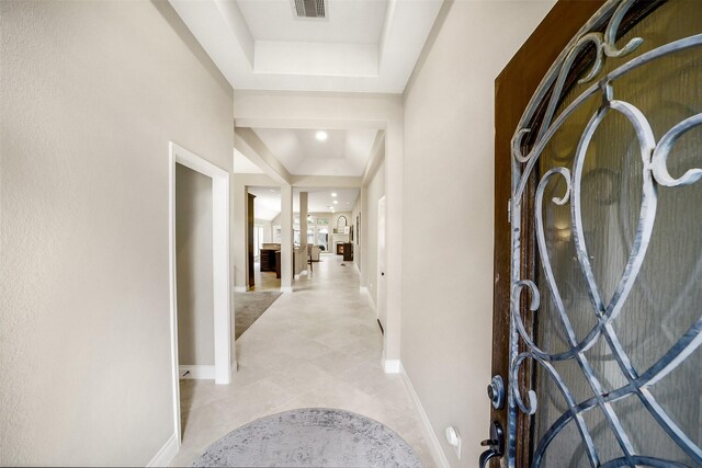 4011 Teramo Ln, Katy, TX 77493 - entryway featuring a tray ceiling and baseboards