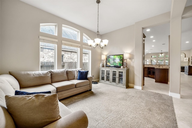 4011 Teramo Ln, Katy, TX 77493 - living area with plenty of natural light, a chandelier, baseboards, light tile patterned floors, and recessed lighting