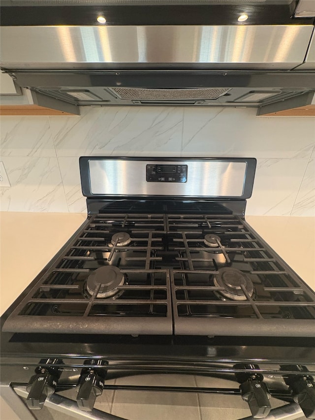 29506 Wilkerson Ln, Katy, TX 77494 - kitchen view of gas range oven and tasteful backsplash