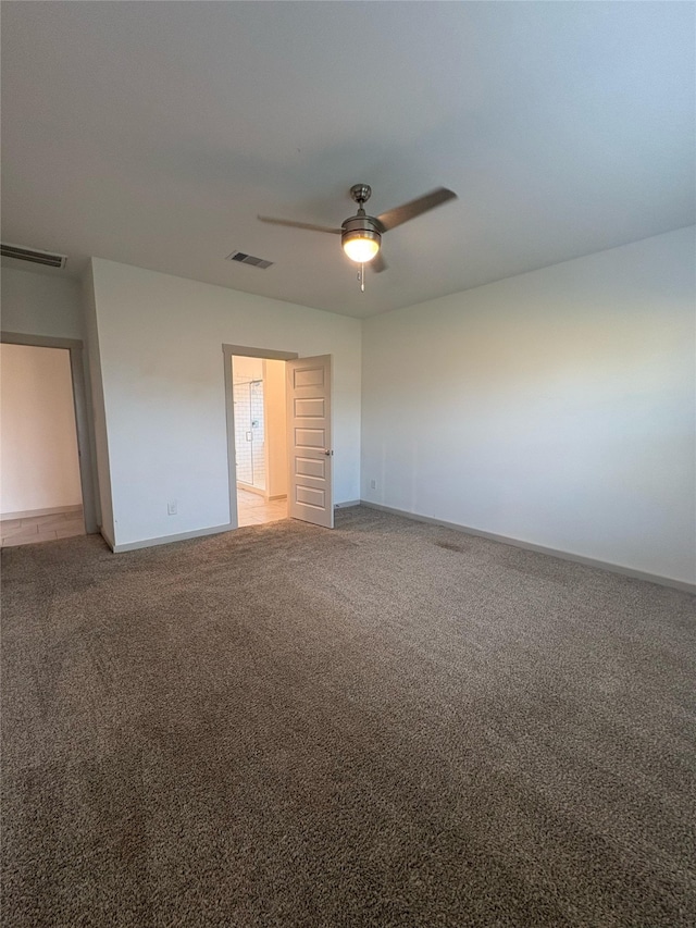 29506 Wilkerson Ln, Katy, TX 77494 - spare room with light colored carpet, ceiling fan, and baseboards