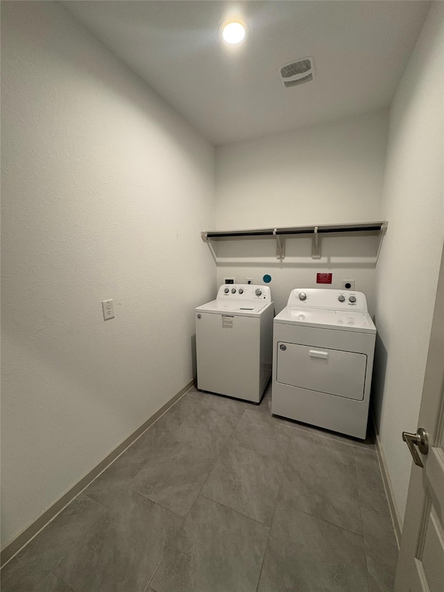 29506 Wilkerson Ln, Katy, TX 77494 - washroom with washer and dryer and baseboards