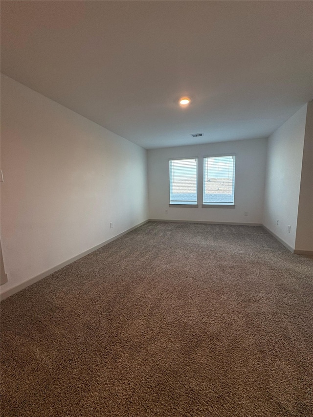 29506 Wilkerson Ln, Katy, TX 77494 - empty room featuring carpet, baseboards, and recessed lighting