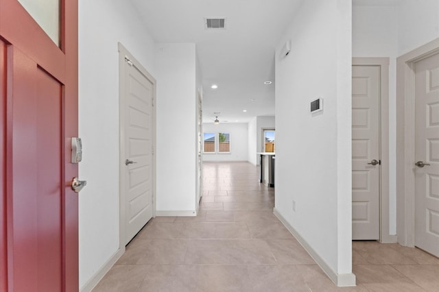 29506 Wilkerson Ln, Katy, TX 77494 - hall with recessed lighting and light tile patterned floors