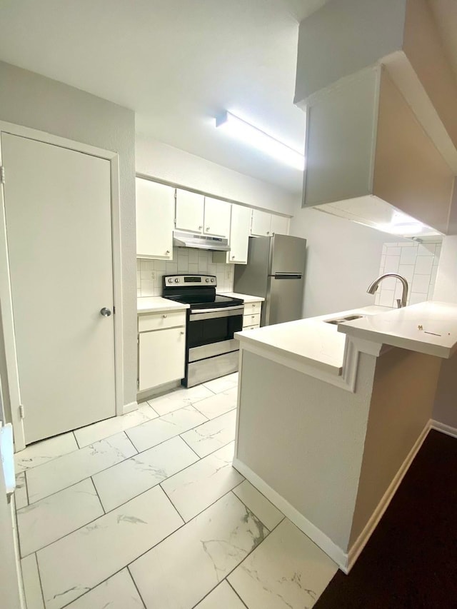 9000 Bissonnet St Unit 707, Houston, TX 77074 - kitchen with appliances with stainless steel finishes, a sink, under cabinet range hood, light marble finish flooring, and baseboards