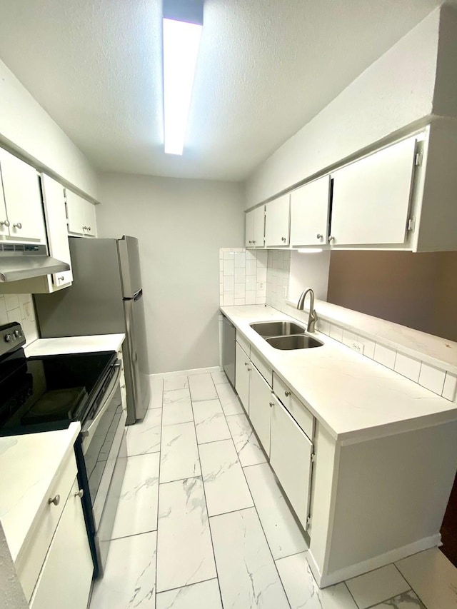 9000 Bissonnet St Unit 707, Houston, TX 77074 - kitchen with under cabinet range hood, electric range, light marble finish floors, a sink, and baseboards