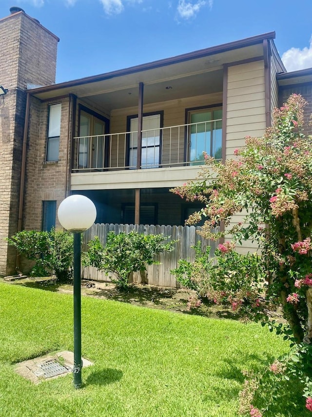 9000 Bissonnet St Unit 707, Houston, TX 77074 - rear view of property with a balcony