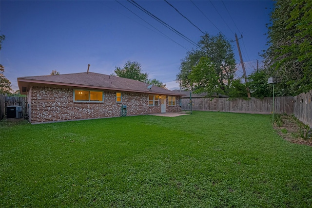 4210 Mona Lee Ln, Houston, TX 77080 - yard at dusk featuring central air condition unit and a patio area