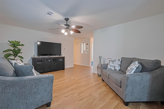 4210 Mona Lee Ln, Houston, TX 77080 - living room with light wood finished floors, ceiling fan, and baseboards