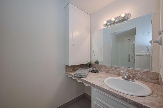4210 Mona Lee Ln, Houston, TX 77080 - bathroom featuring vanity, a shower with shower door, and tile patterned floors