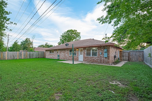 4210 Mona Lee Ln, Houston, TX 77080 - back of property with a patio, brick siding, and a gate