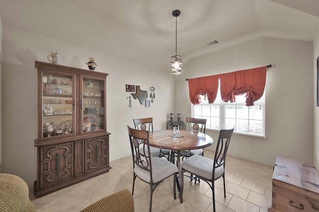 9923 Berlandier Ash Ln, Tomball, TX 77375 - dining area featuring light tile patterned flooring and lofted ceiling