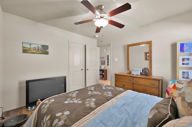 9923 Berlandier Ash Ln, Tomball, TX 77375 - bedroom with ceiling fan and wood finished floors